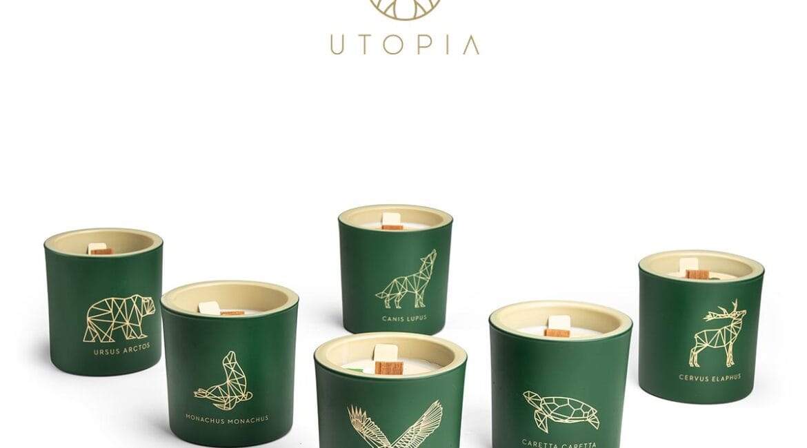Πράσινα κεριά με σχέδια ζώων και το λογότυπο Utopia